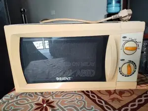 Photo - Orient Microwave Oven - Compact Kitchen Appliance