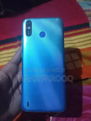 Compact Budget Smartphone with Dual Camera and Lightweight Design