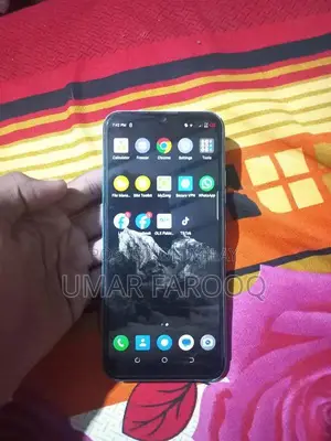 Compact Budget Smartphone with Dual Camera and Lightweight Design