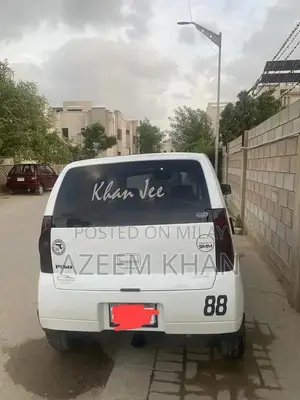 Photo - Alto Nissan Compact Sedan - Registered Imported Vehicle