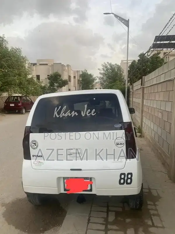 Alto Nissan Compact Sedan - Registered Imported Vehicle