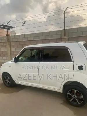 Alto Nissan Compact Sedan - Registered Imported Vehicle