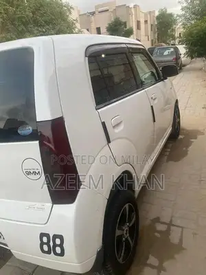 Alto Nissan Compact Sedan - Registered Imported Vehicle