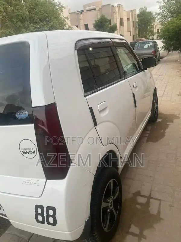 Alto Nissan Compact Sedan - Registered Imported Vehicle