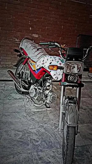 Photo - Honda 70cc Motorcycle - New Engine and Tires