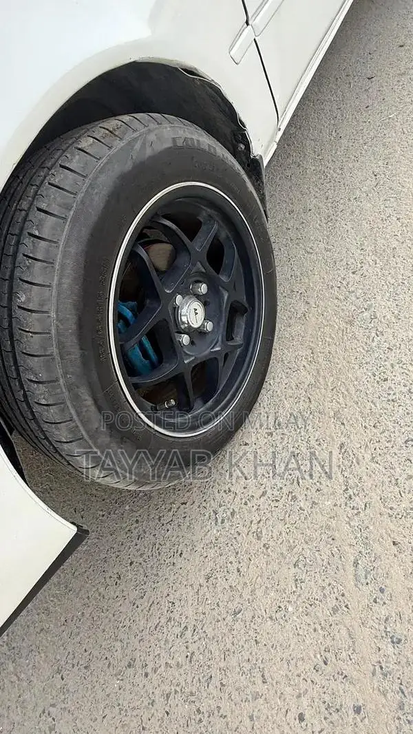 Well-Maintained Vehicle with New Rim and Tyre