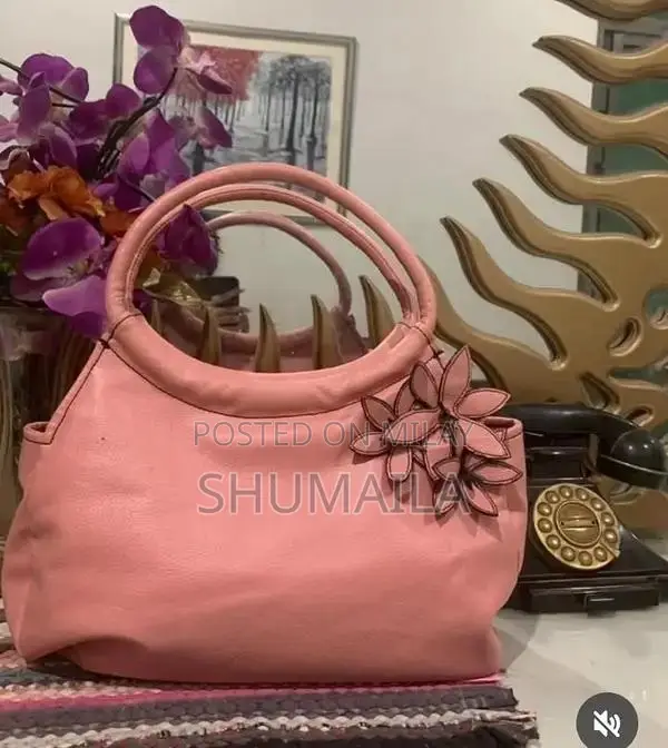 Elegant Pink Leather Shoulder Bag - Stylish Oman Imported Accessory