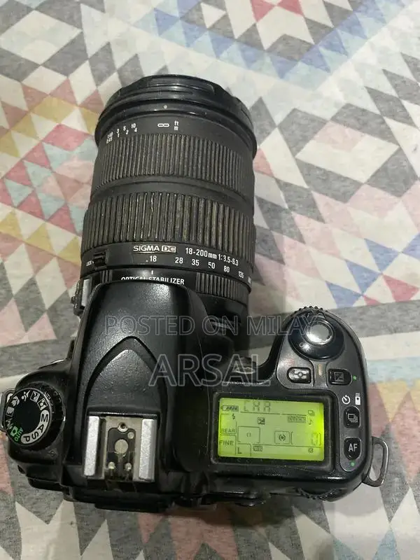 Nikkon Professional DSLR Camera with Multiple Lenses