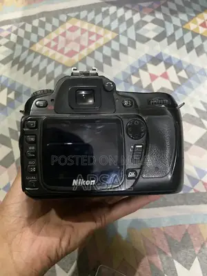 Nikkon Professional DSLR Camera with Multiple Lenses