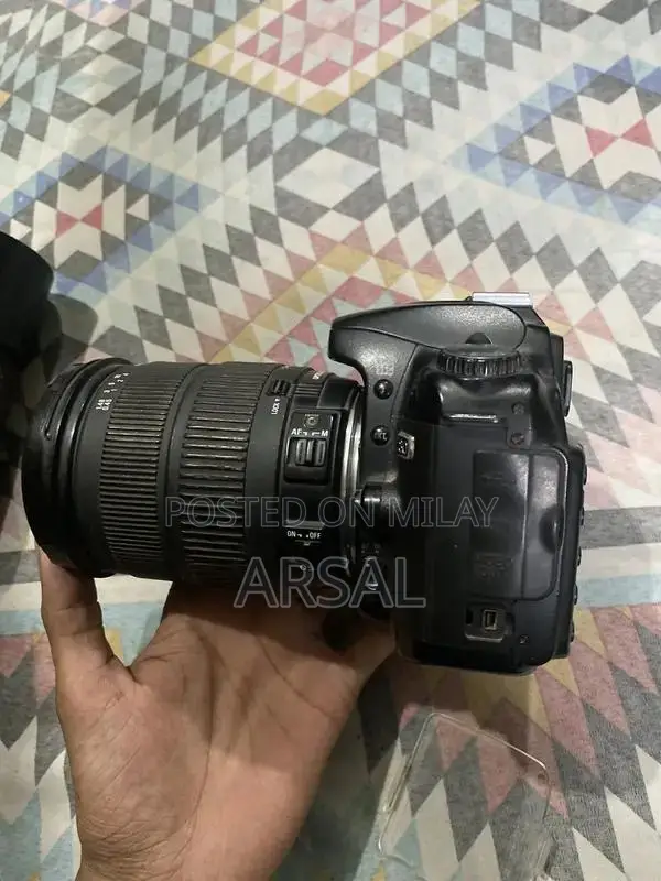 Nikkon Professional DSLR Camera with Multiple Lenses