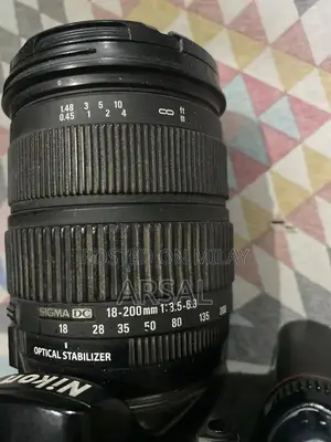 Nikkon Professional DSLR Camera with Multiple Lenses