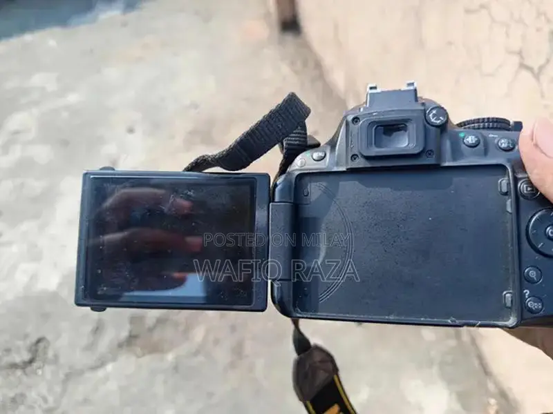 Nikon D5200 DSLR Camera with 50mm Lens and Accessories