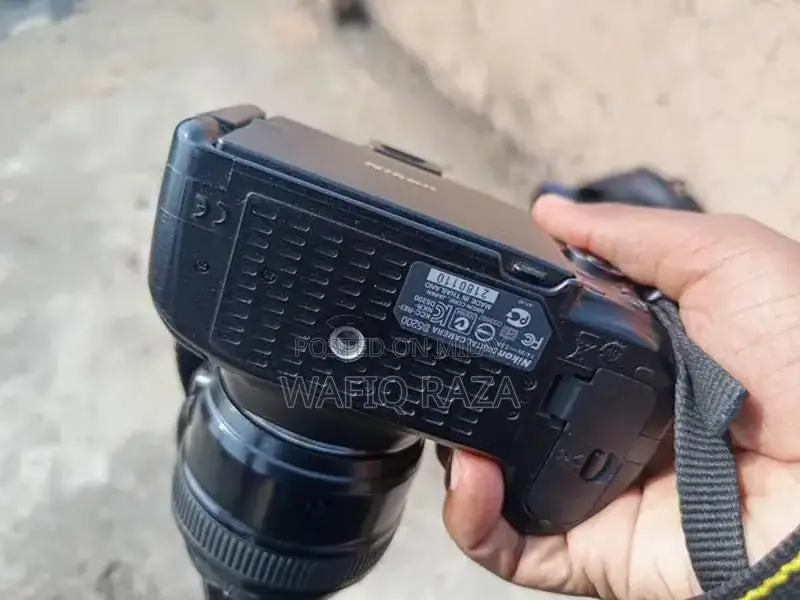 Nikon D5200 DSLR Camera with 50mm Lens and Accessories