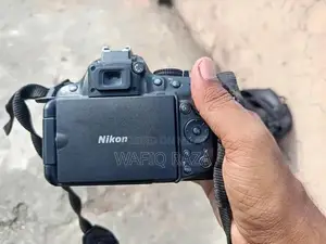 Nikon D5200 DSLR Camera with 50mm Lens and Accessories