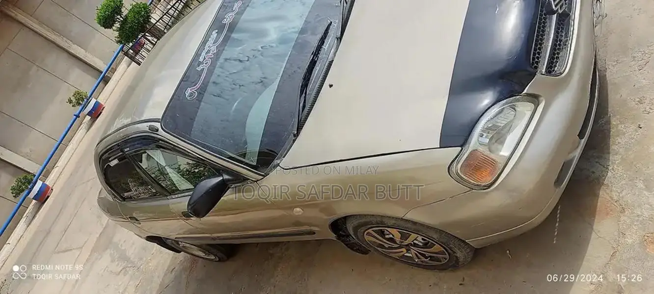 Suzuki Baleno 2005 Gold Sedan - Low Maintenance Family Car