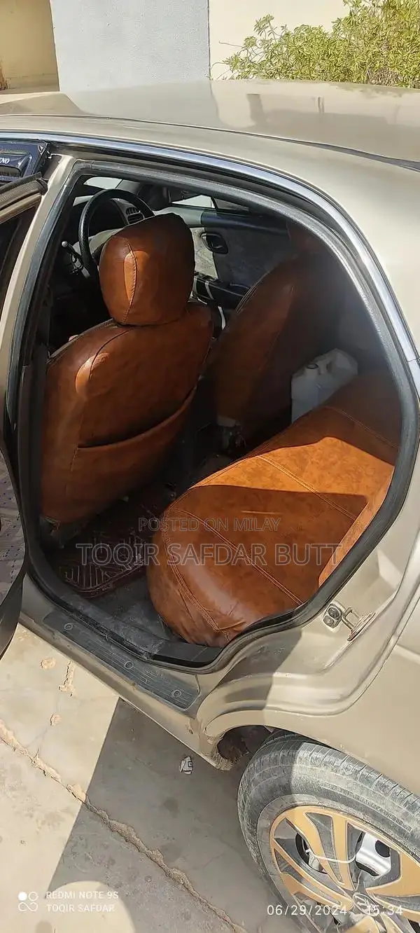 Suzuki Baleno 2005 Gold Sedan - Low Maintenance Family Car