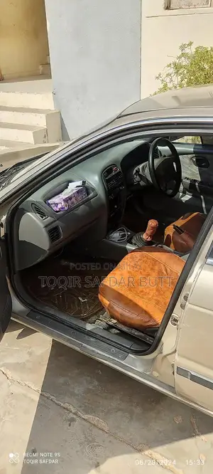 Suzuki Baleno 2005 Gold Sedan - Low Maintenance Family Car