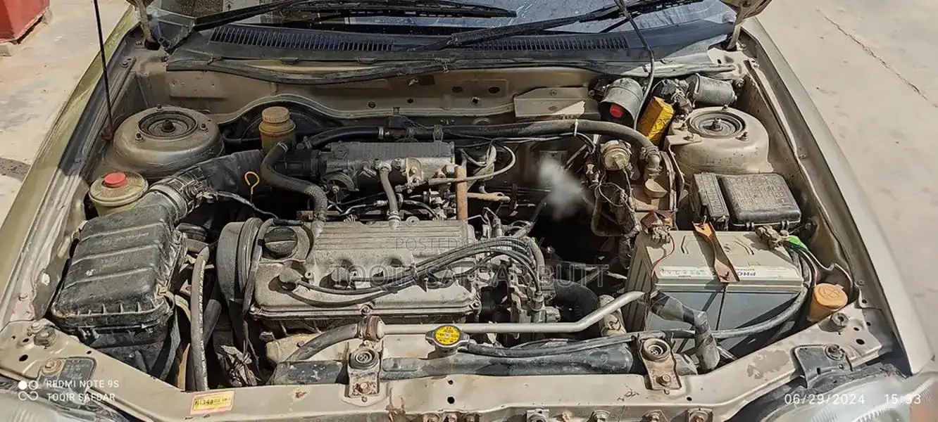 Suzuki Baleno 2005 Gold Sedan - Low Maintenance Family Car