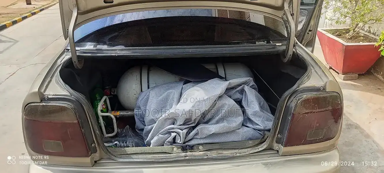 Suzuki Baleno 2005 Gold Sedan - Low Maintenance Family Car