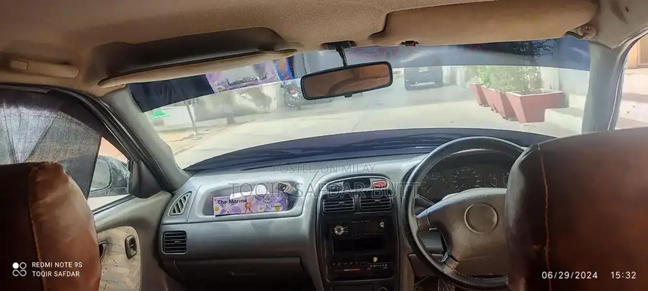 Suzuki Baleno 2005 Gold Sedan - Low Maintenance Family Car