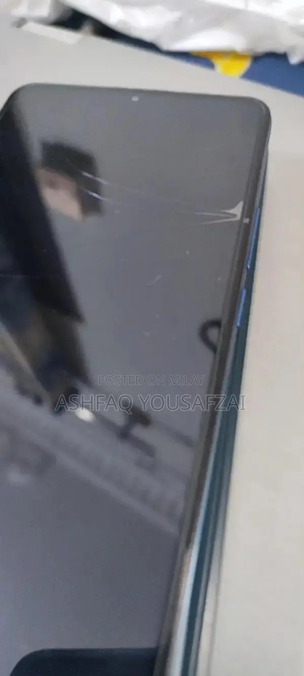 Mid-Range Gaming Smartphone with Cracked Display