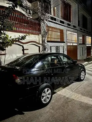 Photo - Honda Civic VTI Sedan 2003 - Well-Maintained Compact Car