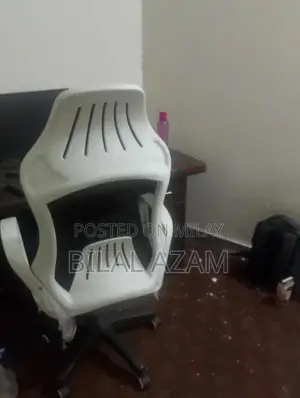 Brown and White Office Table with Gaming Chair