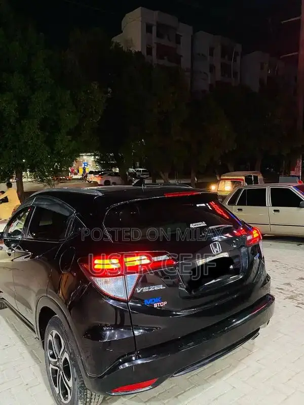 Honda Vezel Z Sensing SUV - Black Exterior, White Interior