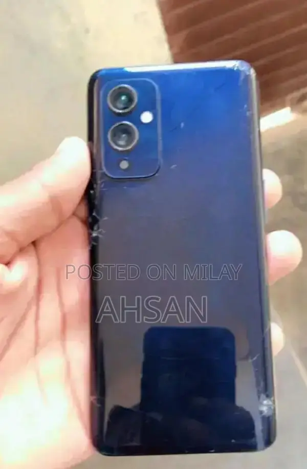 OnePlus 9 5G Smartphone with Partial Damage