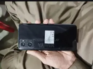 Mid-Range Smartphone with Expandable Storage and Included Accessories