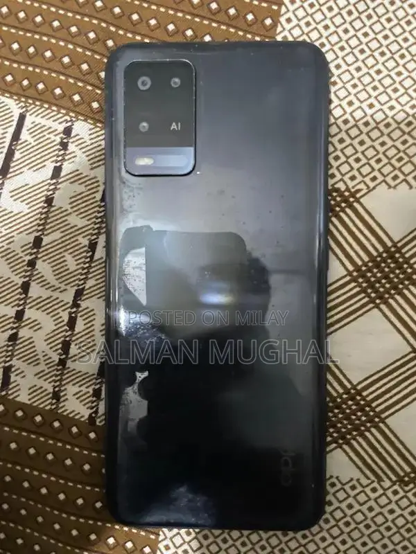 Smartphone with Original Charger and Packaging