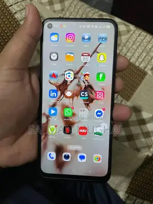 Smartphone with Original Charger and Packaging