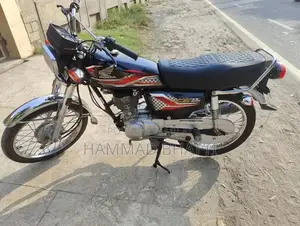 Photo - Honda 125cc Motorcycle - Original Condition, First Owner