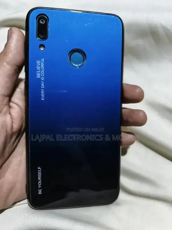 Budget Smartphone with Dual Cameras and Compact Design