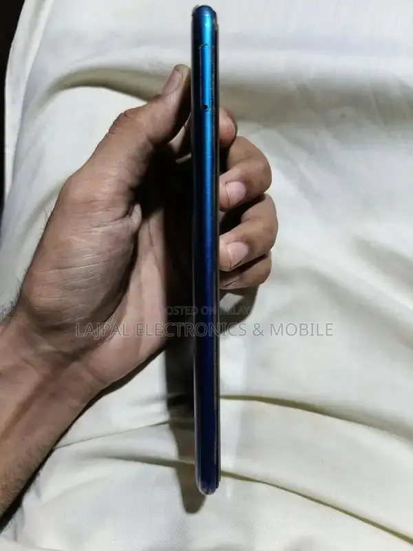 Budget Smartphone with Dual Cameras and Compact Design