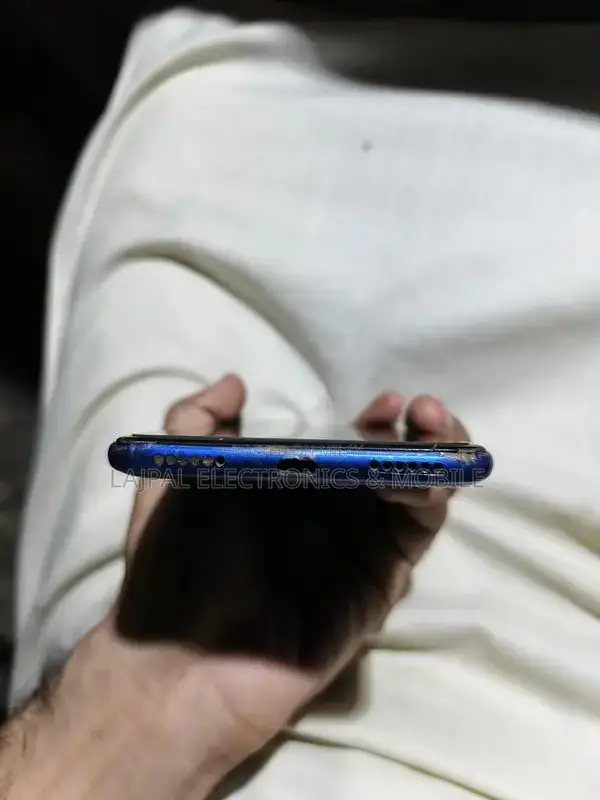 Budget Smartphone with Dual Cameras and Compact Design