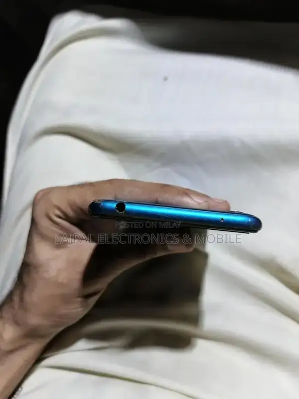 Budget Smartphone with Dual Cameras and Compact Design