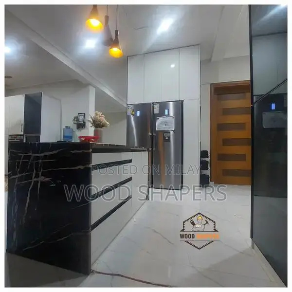 Custom Wood Works: Kitchen Cabinets, Media Walls & Furniture Solutions