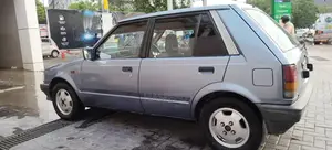 Photo - Daihatsu Charade CX Sedan: Pristine Condition with Premium Features