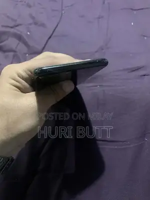 Photo - Apple iPhone 7 Plus 128GB Jet Black Smartphone