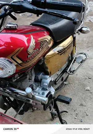 Honda 125cc Self-Start Motorcycle in Gold Finish