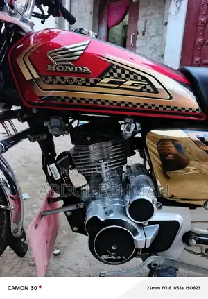 Honda 125cc Self-Start Motorcycle in Gold Finish