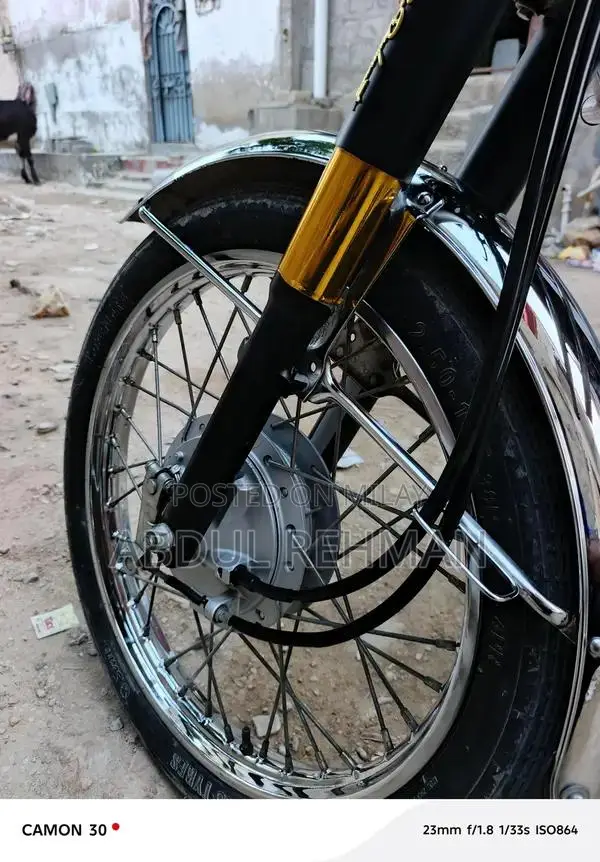 Honda 125cc Self-Start Motorcycle in Gold Finish