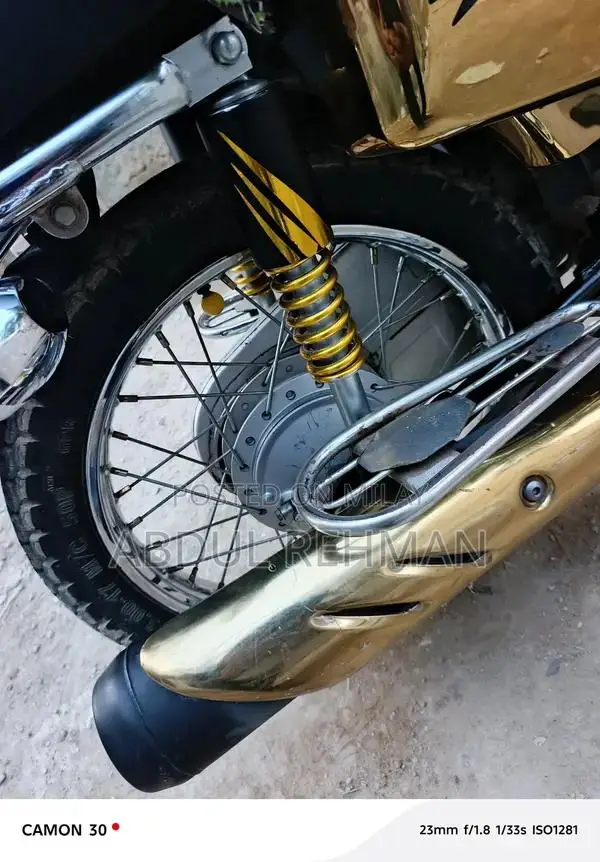 Honda 125cc Self-Start Motorcycle in Gold Finish