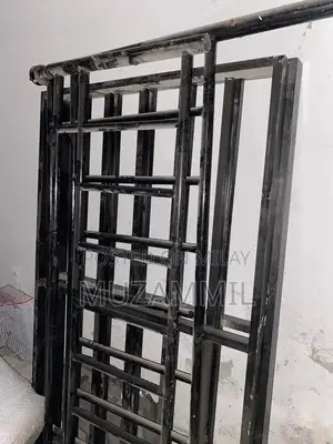 Photo - Black King Size Iron Bed Frame with Full Cage and Fittings