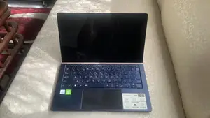 Photo - Asus ZenBook 14 Ultrabook with ScreenPad and Dedicated Graphics