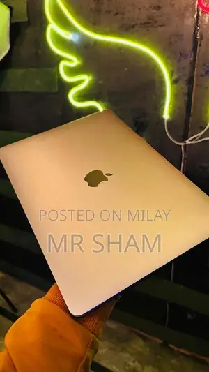 Photo - Apple MacBook Pro 2017 Touchbar Laptop