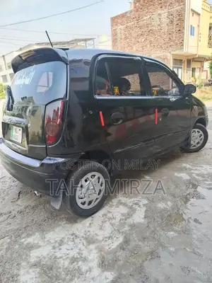 Santro Compact Car with New Tyres and AC