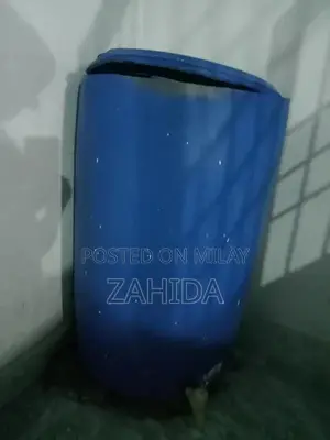 Photo - Large Blue Water Tanker with Dispensing Tap