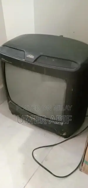 Photo - Vintage Panasonic 14-Inch Television with Original Remote Control